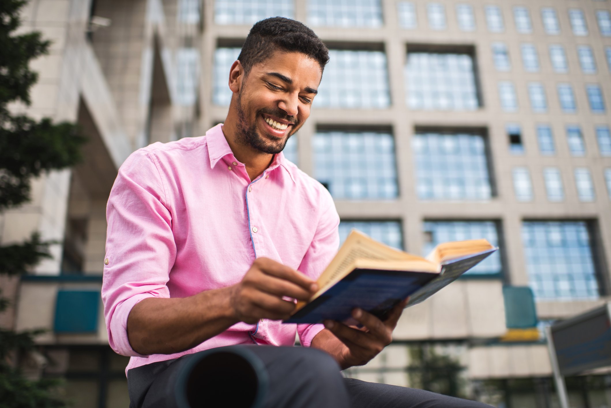 man reading book